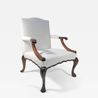 A GEORGE II STYLE MAHOGANY ARMCHAIR