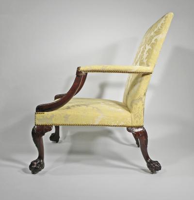 A GEORGE II STYLE MAHOGANY LIBRARY ARMCHAIR