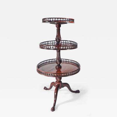 A GEORGE III MAHOGANY THREE TIER DUMBWAITER
