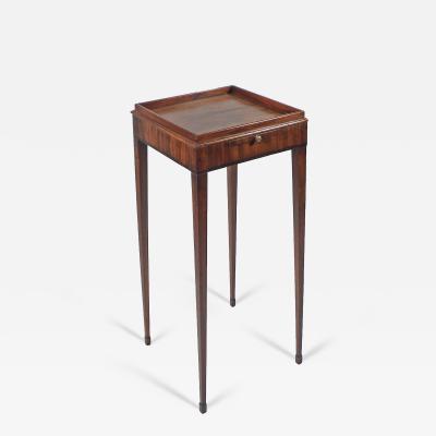 A GEORGE III MAHOGANY URN STAND