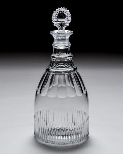 A GEORGIAN SLICE FLUTE MAGNUM DECANTER WITH SUNBURST STOPPER