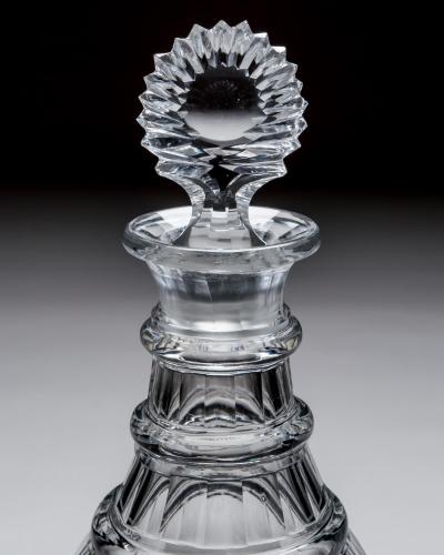 A GEORGIAN SLICE FLUTE MAGNUM DECANTER WITH SUNBURST STOPPER