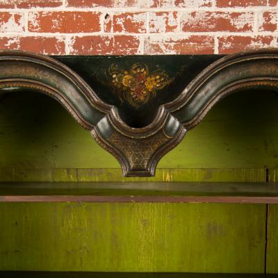 A George I green Japanned and parcel gilt lacquer bureau cabinet