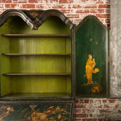 A George I green Japanned and parcel gilt lacquer bureau cabinet