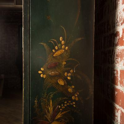 A George I green Japanned and parcel gilt lacquer bureau cabinet