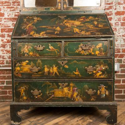 A George I green Japanned and parcel gilt lacquer bureau cabinet
