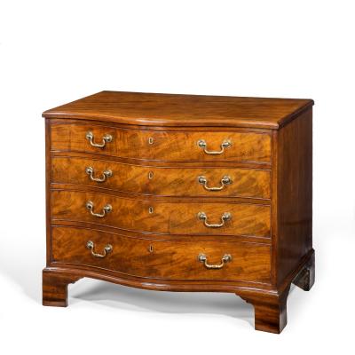 A George III Chippendale period mahogany serpentine chest