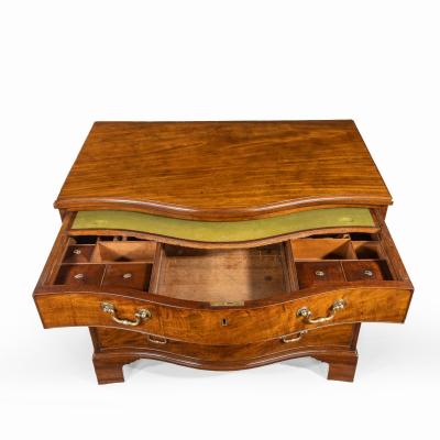 A George III Chippendale period mahogany serpentine chest