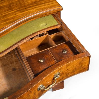 A George III Chippendale period mahogany serpentine chest