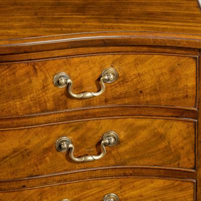 A George III Chippendale period mahogany serpentine chest