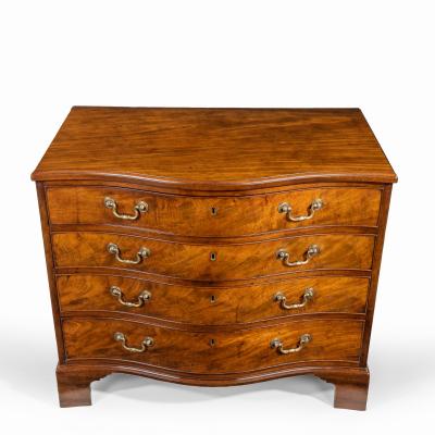 A George III Chippendale period mahogany serpentine chest
