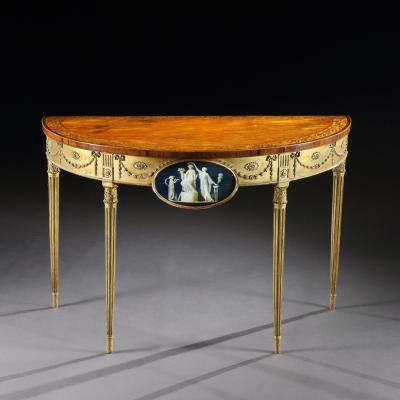 A George III Satinwood Marquetry Giltwood and Composition Demi Lune Side Table