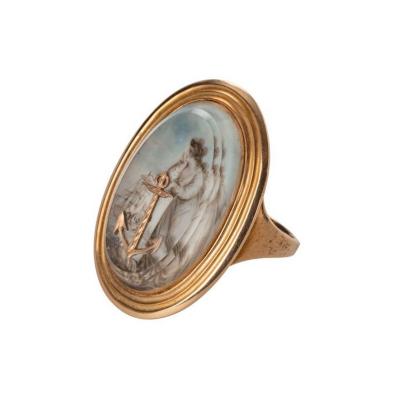 A George III gold ring depicting Hope 