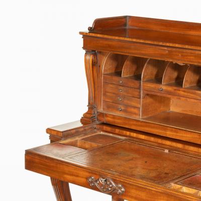 A George IV mahogany mechanical escritoire attributed to Gillows