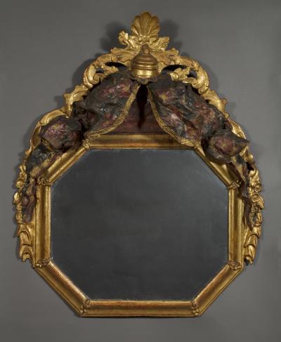 A Giltwood Octagonal Mirror With Floral Painted Canopy Crest