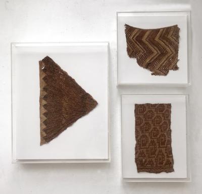 A Group of Three Framed Pre Columbian Textile Fragments