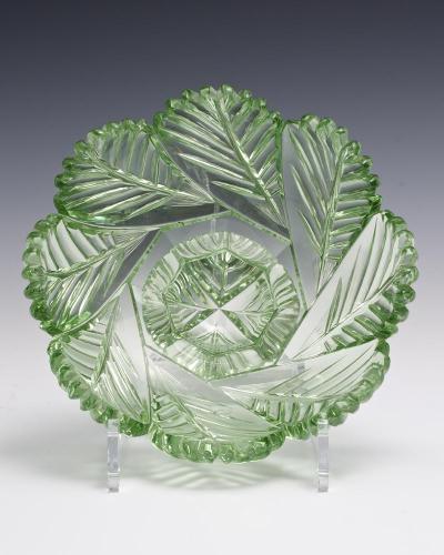 A HIGHLY UNUSUAL SUITE OF GREEN FEATHER CUT WILLIAM IV BOWLS