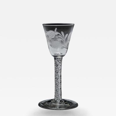 A JACOBITE ENGRAVED AIR TWIST WINE GLASS