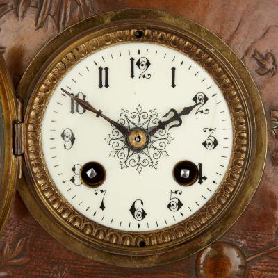 A Japonisme gilt bronze and brass three piece clock set