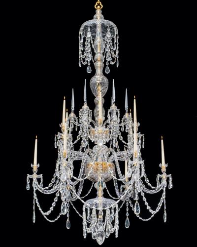 A LARGE GEORGE III STYLE 12 LIGHT CRYSTAL CHANDELIER