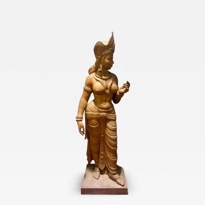 A LIFE SIZE CARVED WOOD SCULPTURE OF THE HINDU GODDESS PARVATI