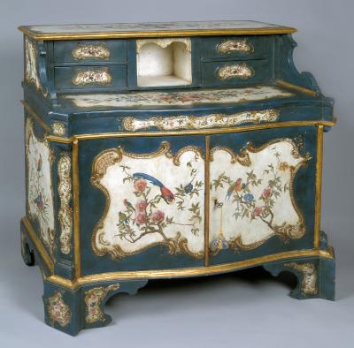 A Lacquered and Gilded Wood Cabinet and Desk