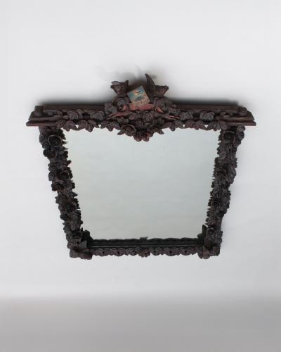 A Large 1880s Hand Carved Black Forest Mirror