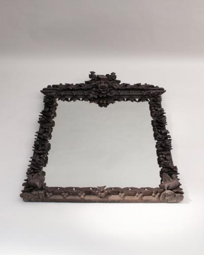 A Large 1880s Hand Carved Black Forest Mirror
