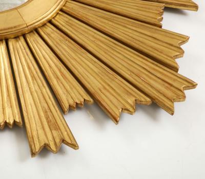 A Large Giltwood Sunburst Mirror