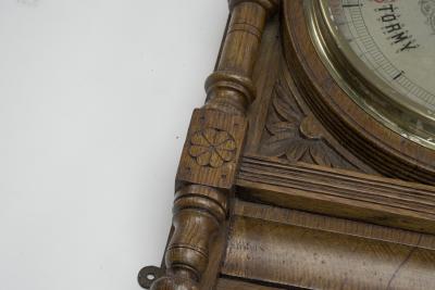 A Large Gothic Revival Carved Oak Barometer with a Rare Snail Tail Thermometer