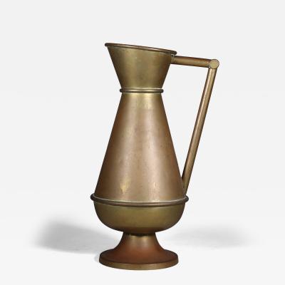 A Large Gothic Revival Heavy Brass Jug with a Simple Angular Form Handle