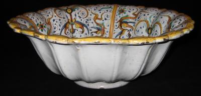 A Large Lobed Earthenware Bowl with Grotesque Decorations