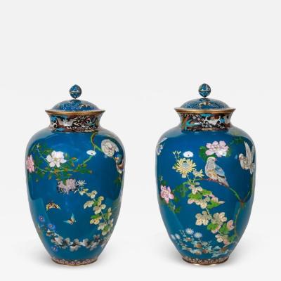 A Large Pair of Japanese Cloisonne Enamel Blue Ground Vases and Covers Meiji