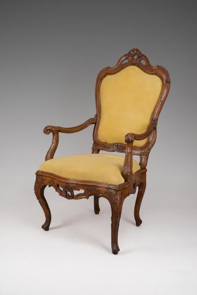 A Large Walnut Openwork Carved Venetian Armchair