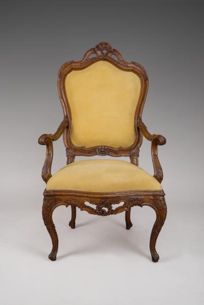 A Large Walnut Openwork Carved Venetian Armchair