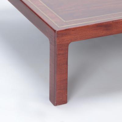 A Large rosewood and brass inlaid Brazilian coffee table C 1975