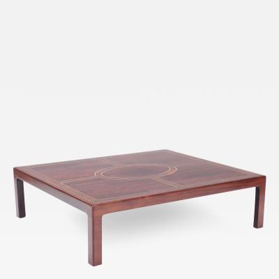 A Large rosewood and brass inlaid Brazilian coffee table C 1975