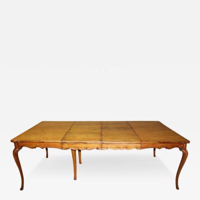 A Late 18th Century French Louis XV Provincial Cherry Dining Table