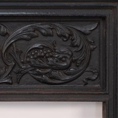 A Late Victorian Fireplace with Stylized Floral Details to the Top