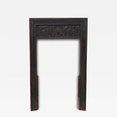 A Late Victorian Fireplace with Stylized Floral Details to the Top