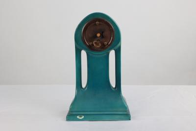 A Little Turquoise Blue Dressing Table Clock Decorated with Cherubs by a Tree