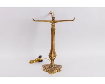 A Louis Majorelle and Daum Nancy Gilt Bronze and Pink Glass Table Lamp