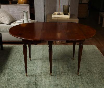 A Louis XVI Dining Table