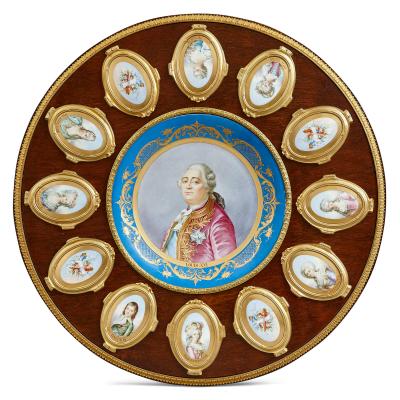 A M E Fournier Neoclassical style porcelain and gilt bronze mounted circular table by Fournier