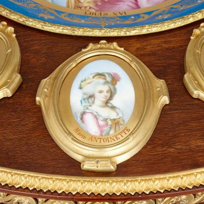 A M E Fournier Neoclassical style porcelain and gilt bronze mounted circular table by Fournier
