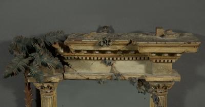 A MOST UNUSUAL FINELY CARVED AND NATURALISTICALLY PAINTED MIRROR