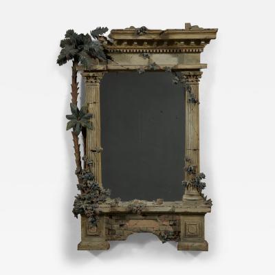 A MOST UNUSUAL FINELY CARVED AND NATURALISTICALLY PAINTED MIRROR