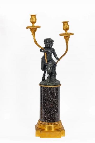 A Magnificent Pair of Louis XVI Style Gilt Bronze Candelabra on Porphyry Bases