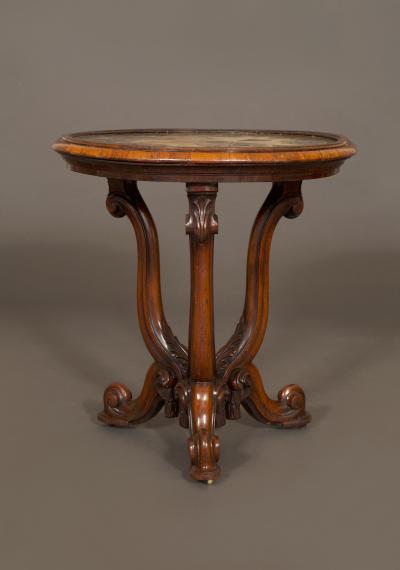 A Mahogany Center Table of Interesting Design With Inset Septarian Nodule Top