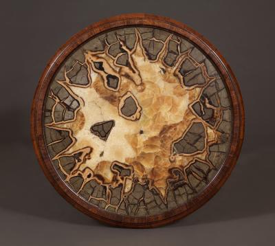 A Mahogany Center Table of Interesting Design With Inset Septarian Nodule Top